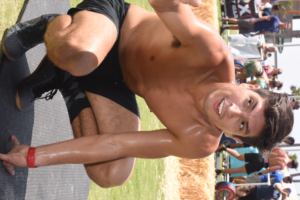 Athlete squatting with a barbell